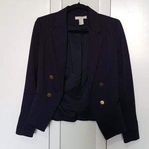 Navy blazer with gold buttons